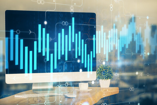 Financial graph colorful drawing and table with computer on background. Double exposure. Concept of international markets. © peshkova