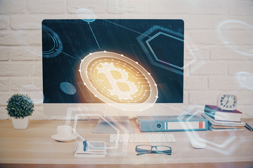 Double exposure of blockchain and crypto economy theme hologram and table with computer background. Concept of bitcoin cryptocurrency.