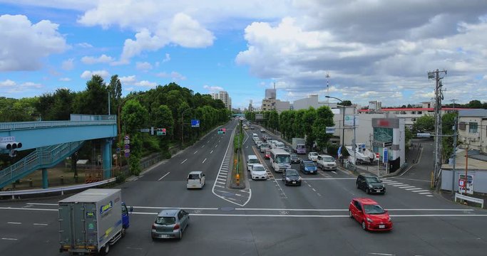 A downtown street at Kanpachi avenue in Tokyo daytime