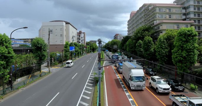 A downtown street at Kanpachi avenue in Tokyo daytime