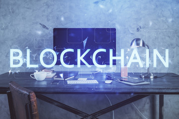 Obraz premium Double exposure of blockchain and crypto economy theme hologram and table with computer background. Concept of bitcoin cryptocurrency.
