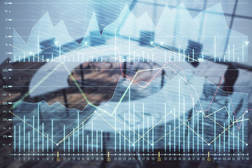 Double exposure of forex chart on conference room background. Concept of stock market analysis