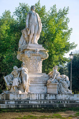 Fototapeta na wymiar Villa Borghese gardens, statue of german writer Johann Wolfgang von Goethe