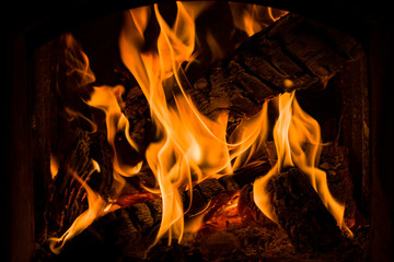 fire burning bright flame on a dark background.