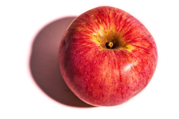 Red natural apples with shadow isolated on white background