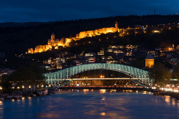 Night view of Peace bridge and Narikala fortress in Tbilisi