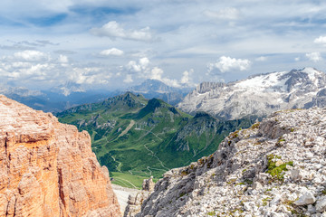 Fototapeta na wymiar Beautiful view of Marmolada glasier and Pass Pordoi valley from Piz Boe mountain peak. Italian Dolomites, Alto Adige