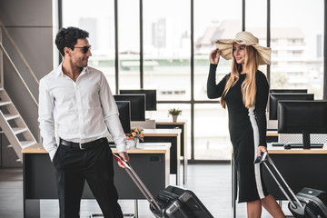 Employee in office ready to travel on summer vacation and celebrating the summer holidays. Attending summer festivals, celebrating the summer Concept.