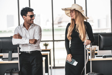 Employee in office ready to travel on summer vacation and celebrating the summer holidays. Attending summer festivals, celebrating the summer Concept.