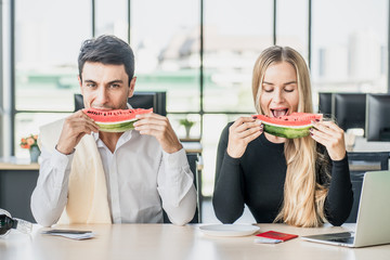 Employee in office ready to travel on summer vacation and celebrating the summer holidays. Attending summer festivals, celebrating the summer Concept.