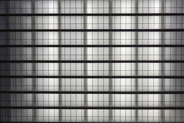 Steel frame black and white grid background glowing pattern