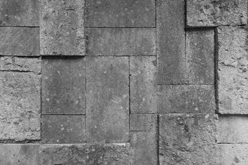 Cement or concrete block wall background in black and white color scale. Surface pattern texture photo. 