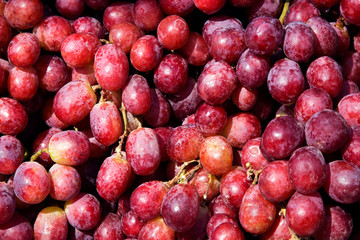 Red wine grapes background