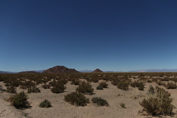Landscape with mountains and blue sky