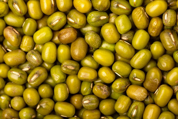 Macro image of green mung beans as natural food background.