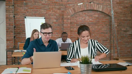 Modern Loft Startup Office Team. Young Diverse Multiethnic Group of Authentic People Talk and Discuss Projects by Couples. 4K Medium Static Shot