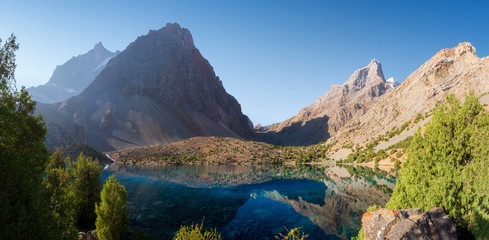 Fototapeta na wymiar Alaudin lakes in Fann mountains, Tajikistan. Picturesque panorama of turquoise lake in Fann mountains. Beautiful nature landscape.
