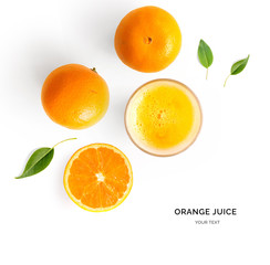 Creative layout made of orange juice. Flat lay. Food concept. Orange on the white background.