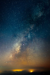 Beautiful landscape of  top mountains in  winter starry night sky with Milky Way background, Chiang mai , Thailand