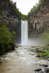 Taughannock Falls is a 215-foot (66 m) plunge waterfall, that is the highest single-drop waterfall...