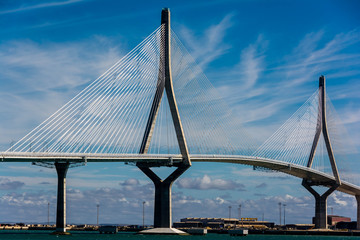 view of the bridge over the bay at Cadiz under a blue sky © Alfonso