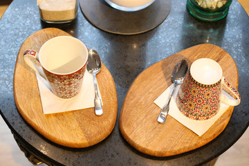 Two cups with spoon ready for some hot or cold drink