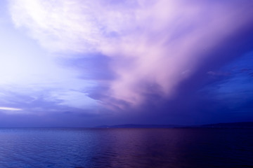 Naklejka na ściany i meble Purple Clouds before Thunderstorm