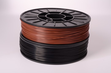Filament for 3D Printer crystal clear and bright against a bright background.