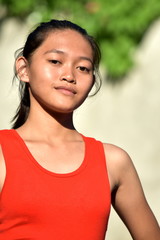 Portrait Of A Youthful Filipina Person