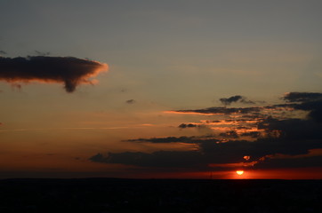 Sunset silhouette of church cross at sunset
