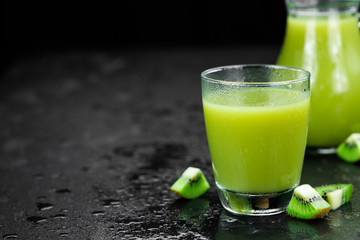 Kiwi Smoothies on a slate slab (selective focus)