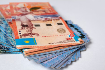 Tenge on white background. Kazakh money. Banknotes tenge. Money Kazakhstan Tenge