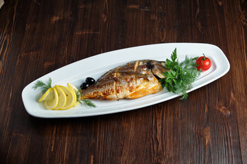 Grilled dorado with vegetables . catering menu