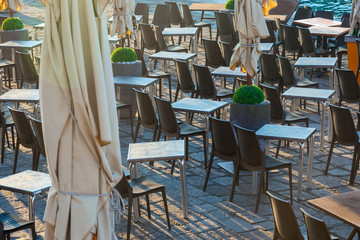 Outdoor restaurant table on San Marco Square, Venice, Italy.
