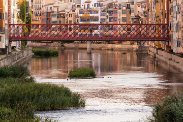The Eiffel Bridge on the Onyar River at dusk in Girona, Catalonia (Spain) © Jorge Fuentes