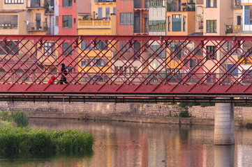 The Eiffel Bridge on the Onyar River at dusk in Girona, Catalonia (Spain) © Jorge Fuentes