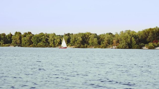 Yacht is sailing on the river