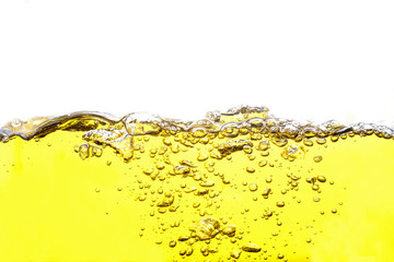 Water splash or water wave with bubbles of air on the background.