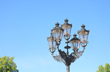 Fototapeta na wymiar Gas lamp in blue sky background