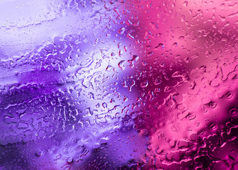 Fototapeta premium Colourful surreal psychedelic abstract liquid background. Water and oil drops with small air bubbles