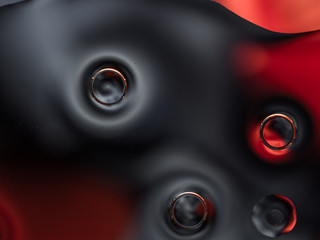 Colourful surreal psychedelic abstract liquid background. Water and oil drops with small air bubbles