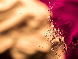 Colourful surreal psychedelic abstract liquid background. Water and oil drops with small air bubbles