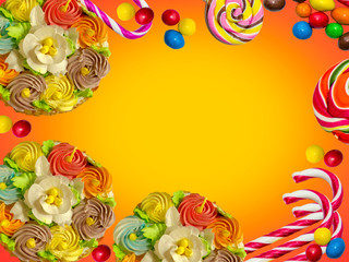Frame made of cakes and sweets on a colored background.