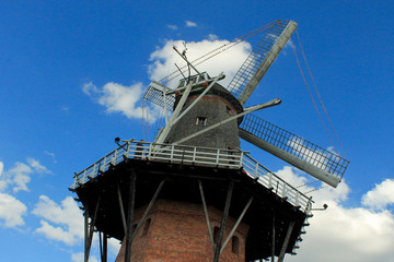 windmill in front of a blue sky