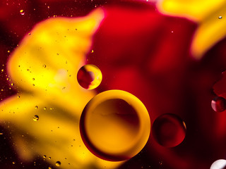 Colourful surreal psychedelic abstract liquid background. Water and oil drops with small air bubbles