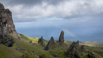 Fototapeta na wymiar Rainbow at the Old Man of Storr Scotland
