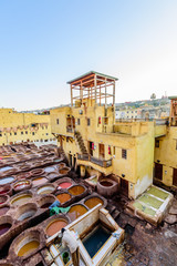 Sightseeing of Morocco. Tanneries of Fez. Dye reservoirs and vats in traditional tannery of city of...