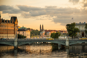 Obraz premium Old Stockholm cityscape, water, bridge, canal.
