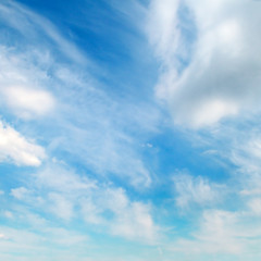 Obraz premium Fluffy clouds in the blue sky.