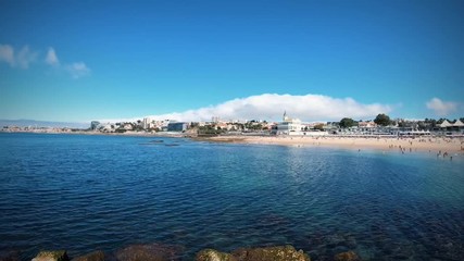 time lapse in a beach in a summer day. Tamariz beach in Estoril Portugal